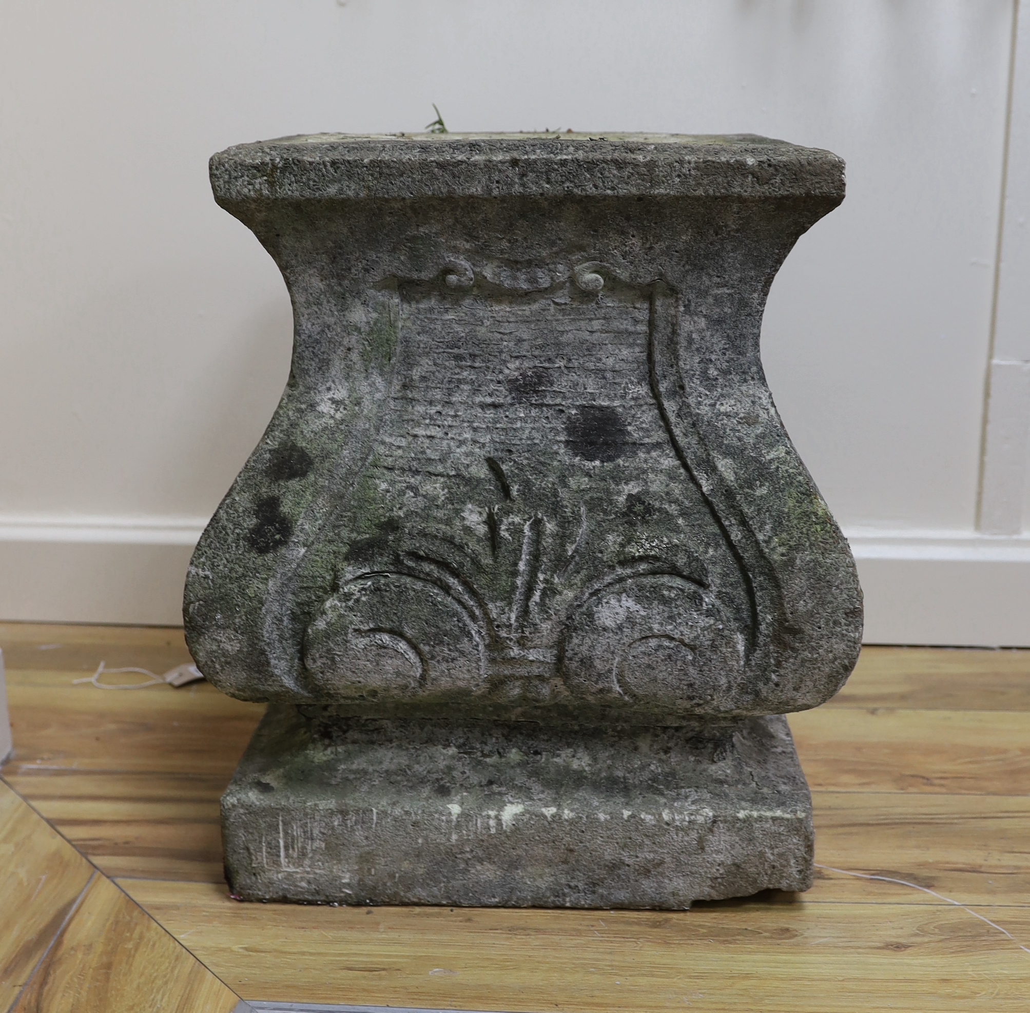 A square reconstituted stone garden plinth, width 36cm, height 50cm